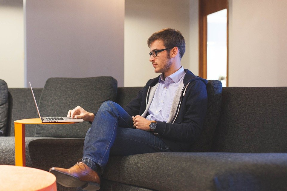 man using his computer